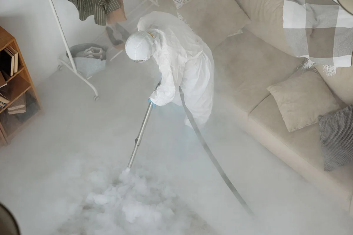 Biohazard cleanup technician in protective equipment, Fayetteville, WV